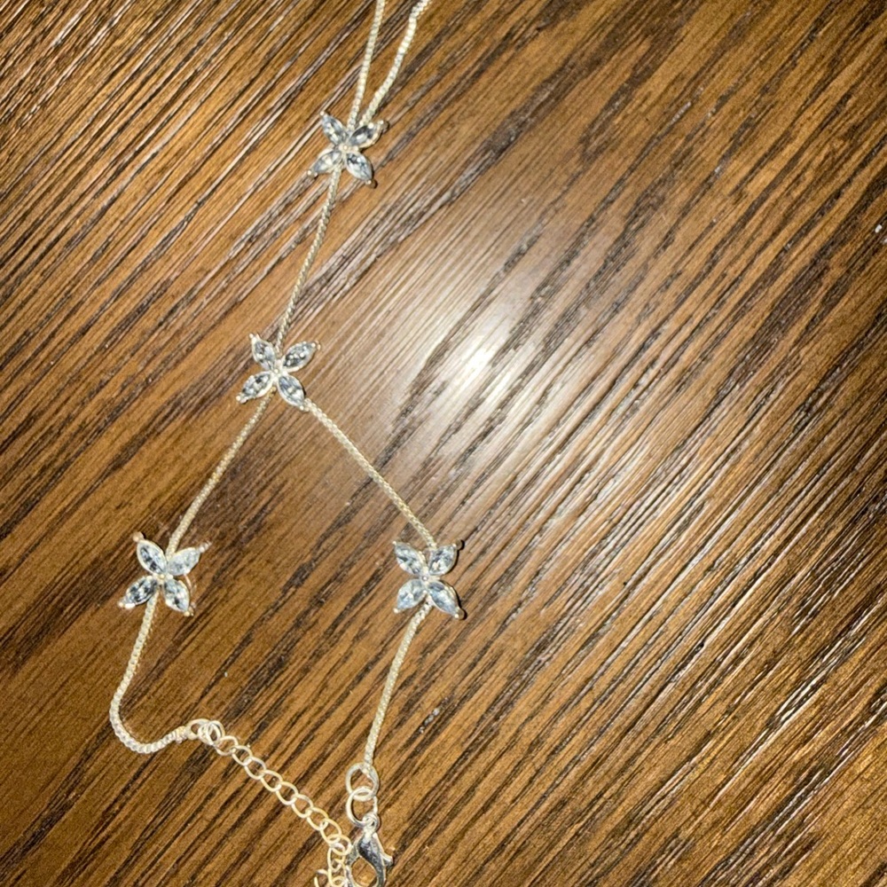 Elegant Silver attached ring bracelet